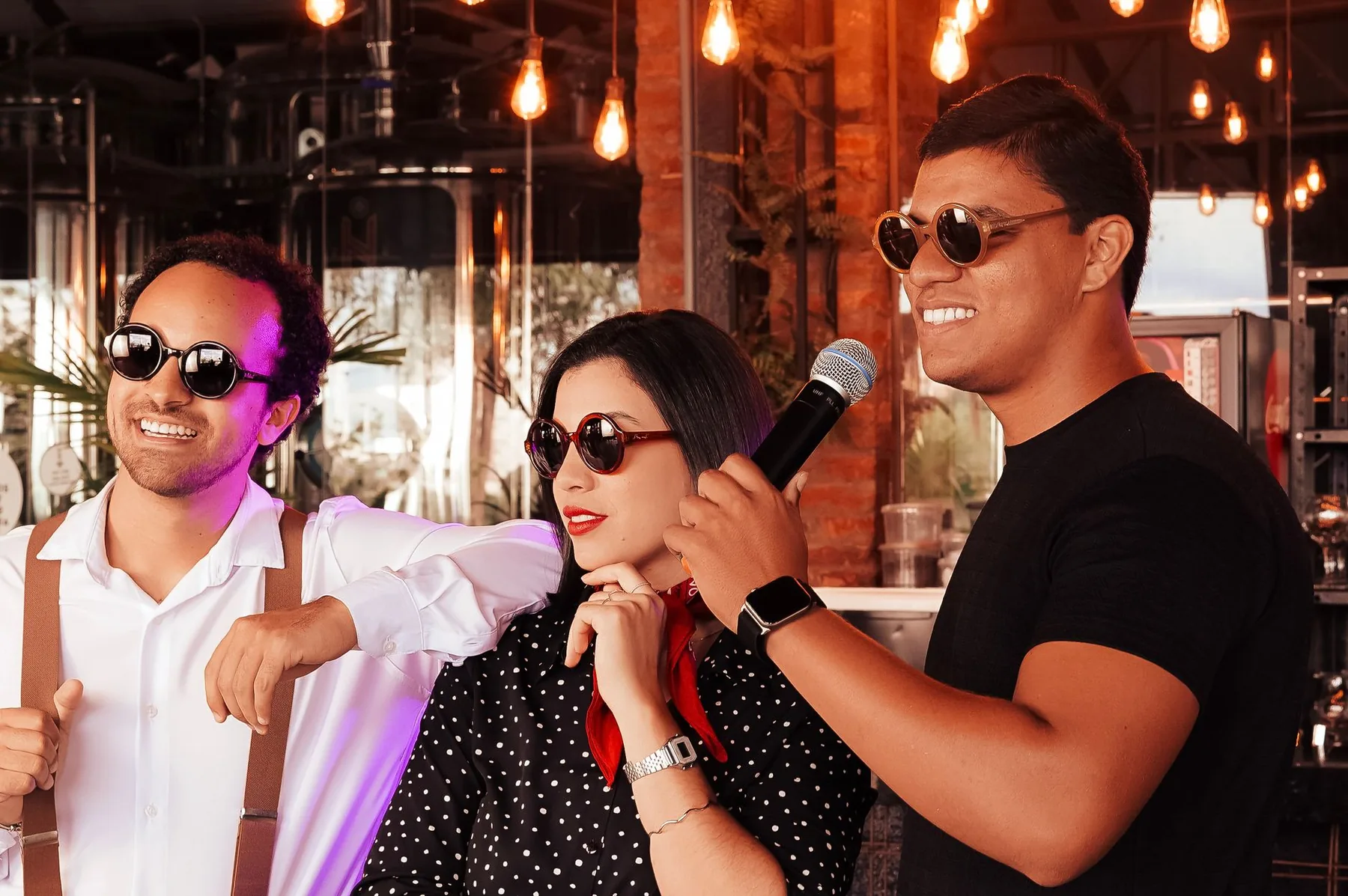 friends singing into a microphone friends singing into a microphone