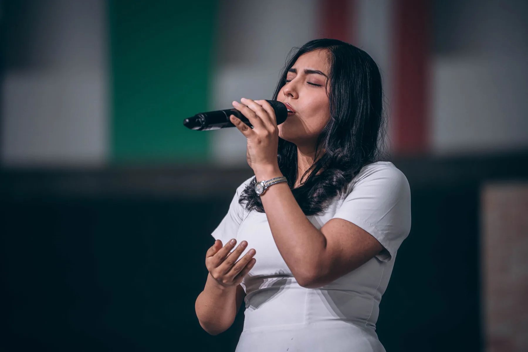 singer on stage with microphone