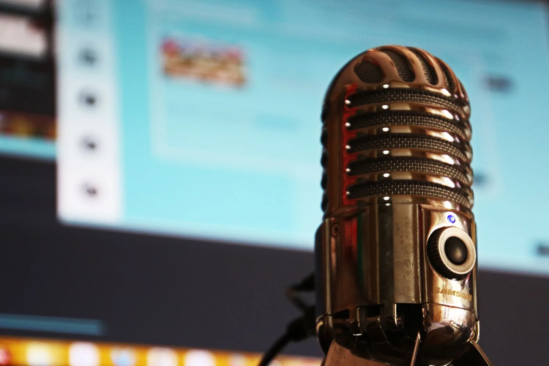 Karaoke microphone in front of a screen Karaoke microphone in front of a screen