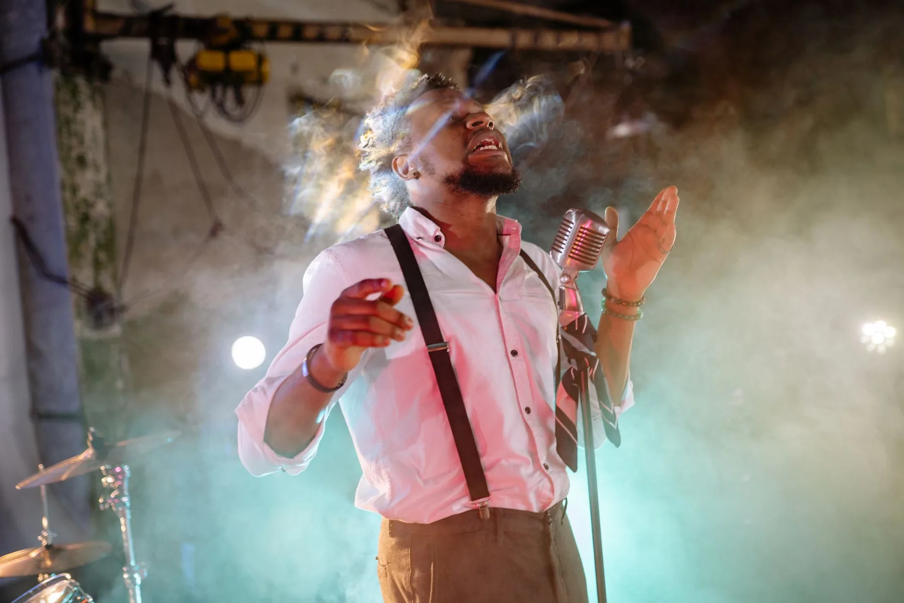 karaoke singer on a smoky stage karaoke singer on a smoky stage