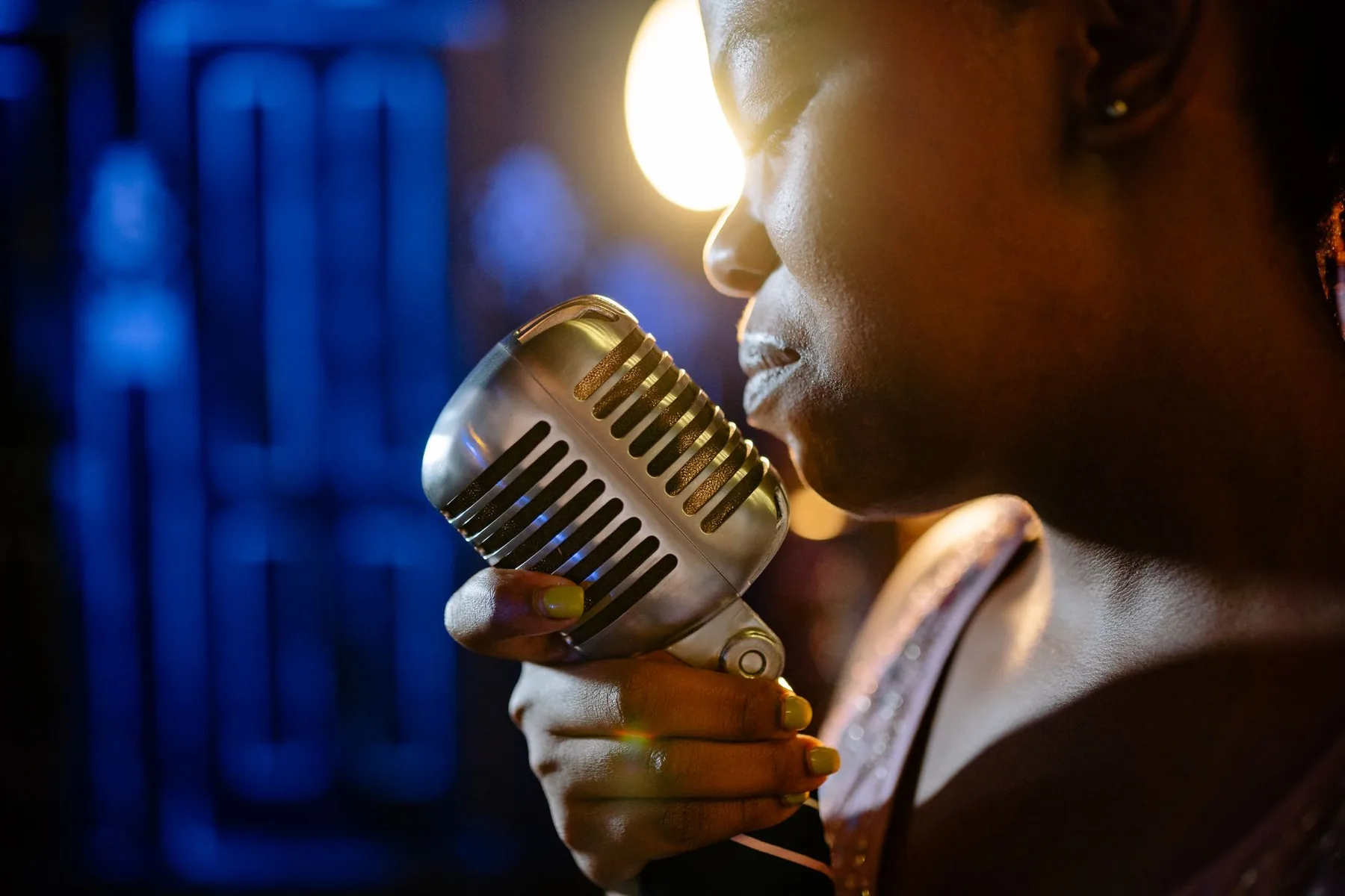 singer at a karaoke microphone singer at a karaoke microphone