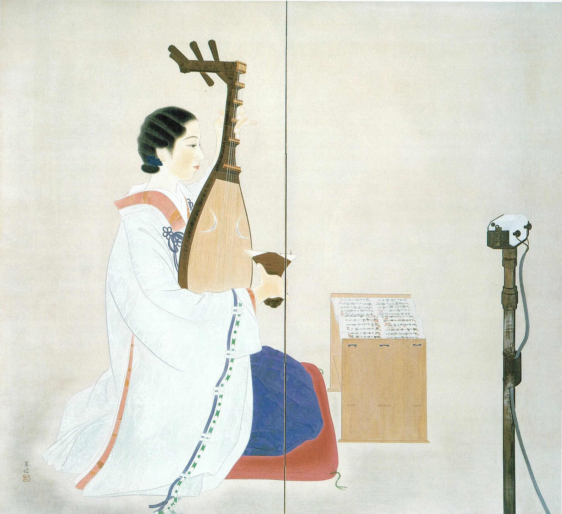 Japanese performer with a musical score Japanese performer with a musical score